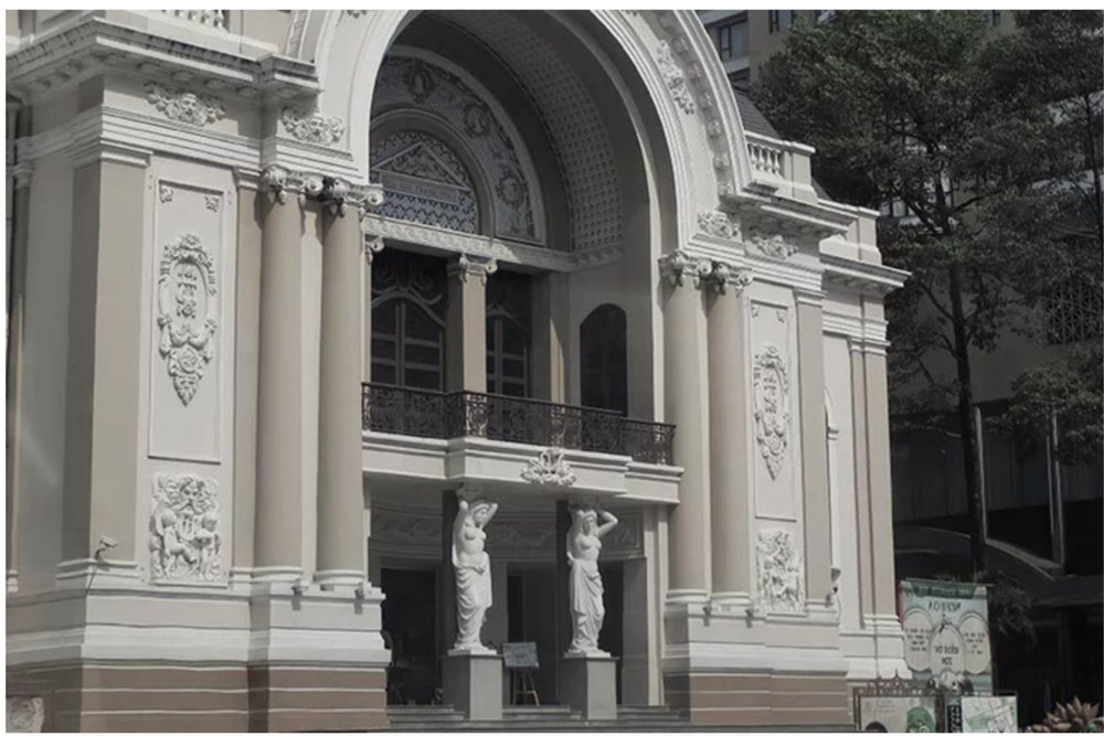The Saigon Opera House façade reflects Petit Palais-inspired decor, featuring Renaissance-style reliefs of semi-nude Goddesses of Art at the entrance